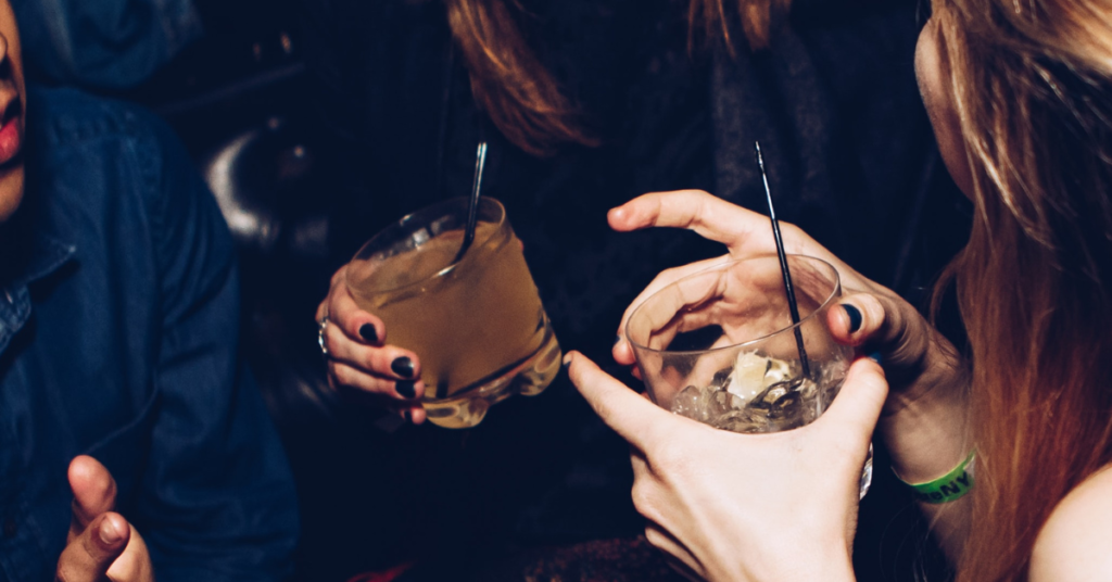 Two women enjoying a drink