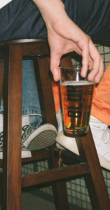 A guy drinking a beer